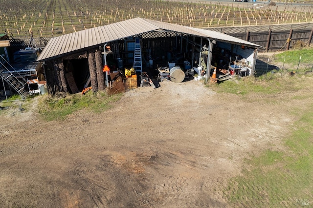 view of outbuilding featuring a rural view