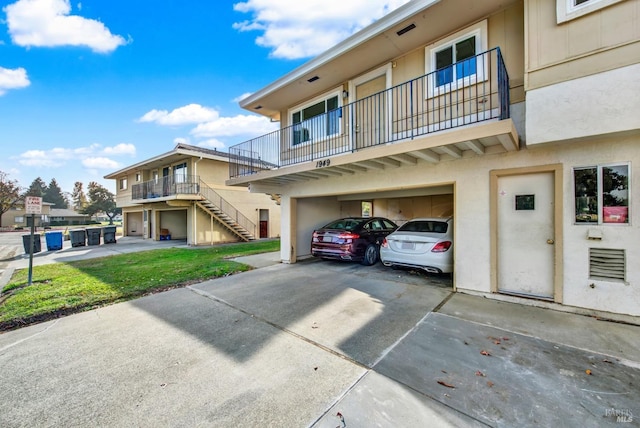 view of front of property with a garage and a front yard