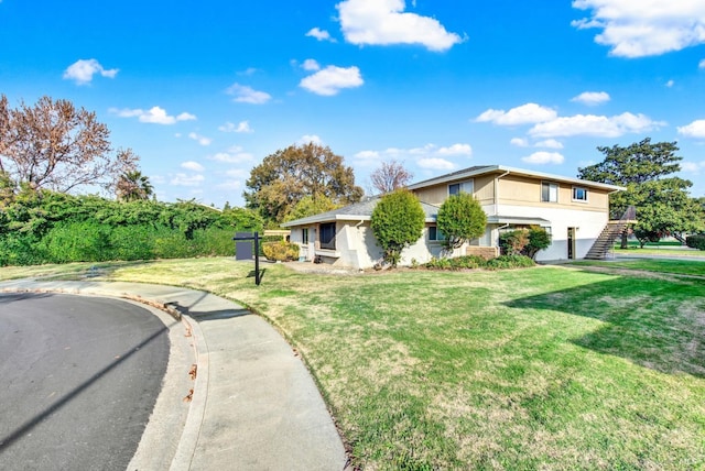 view of front of property with a front yard