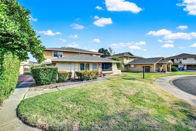 view of front of house with a front lawn