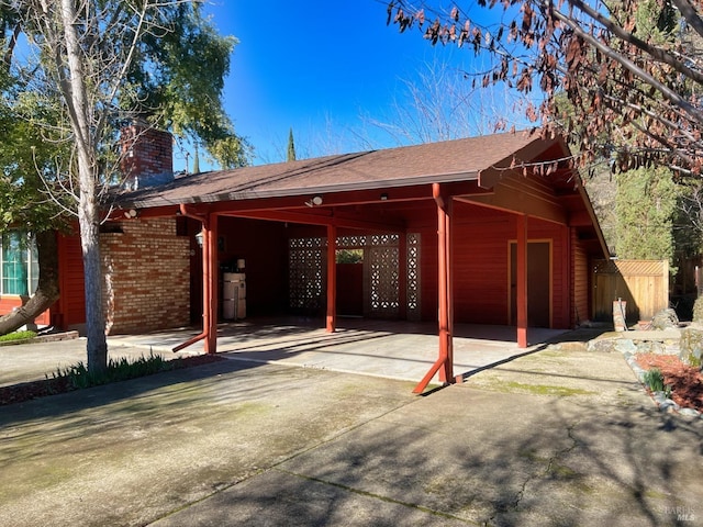 view of parking with a carport