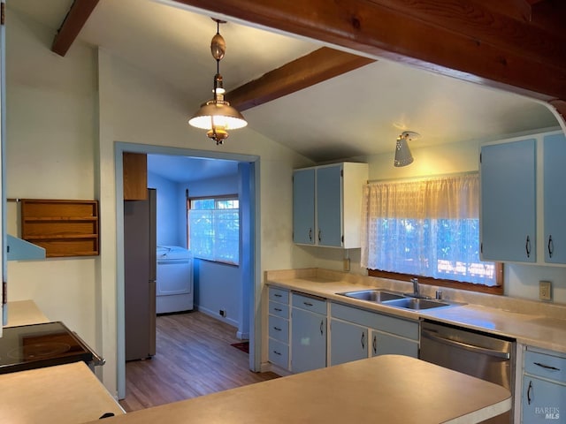 kitchen with pendant lighting, dishwasher, washer / dryer, sink, and lofted ceiling with beams