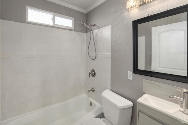 full bathroom with crown molding, toilet, tiled shower / bath, and vanity