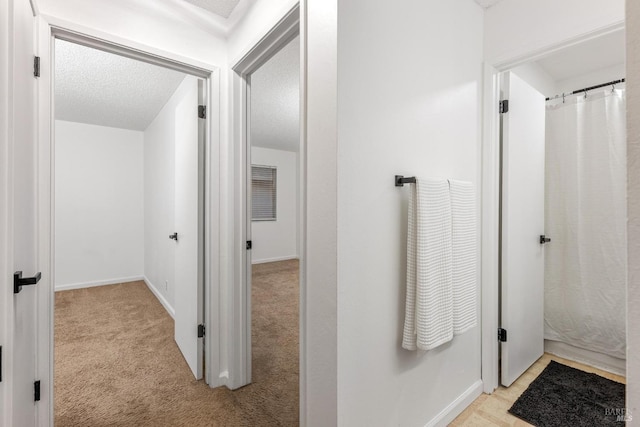 bathroom with a textured ceiling