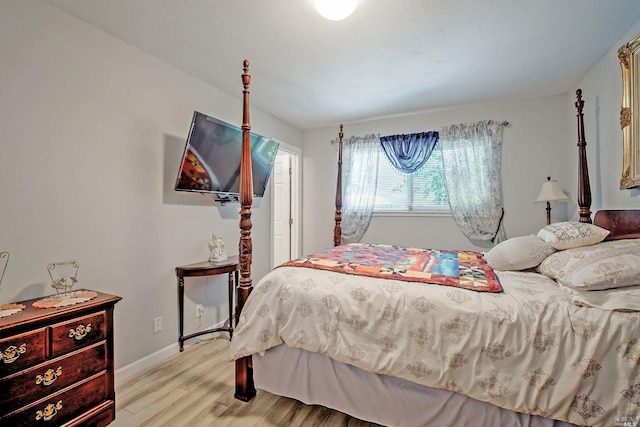 bedroom with light wood-type flooring