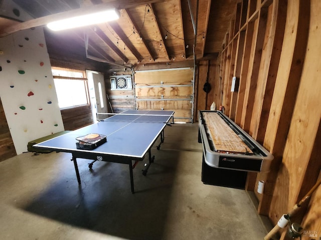 playroom featuring concrete flooring and a garage