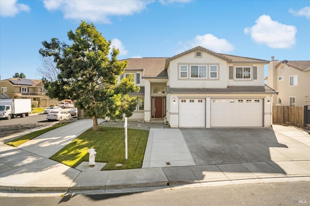 front of property featuring a garage