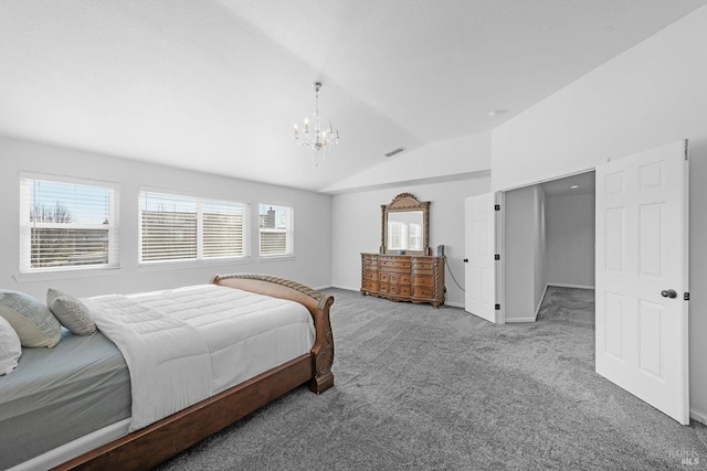 carpeted bedroom with lofted ceiling and an inviting chandelier