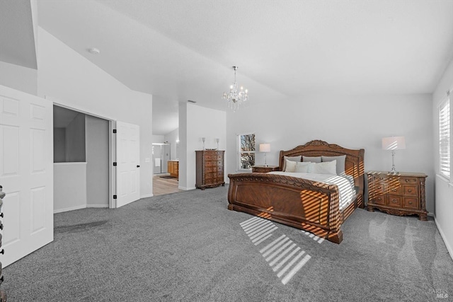 bedroom featuring an inviting chandelier, carpet floors, and lofted ceiling