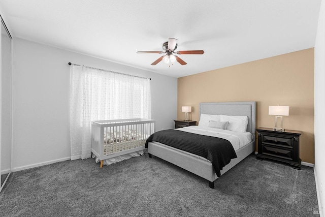 carpeted bedroom with ceiling fan