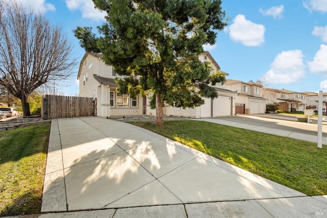 obstructed view of property with a garage and a front yard