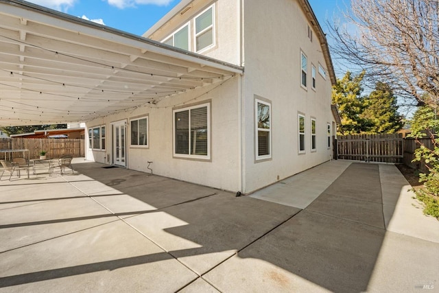 rear view of property with a patio area