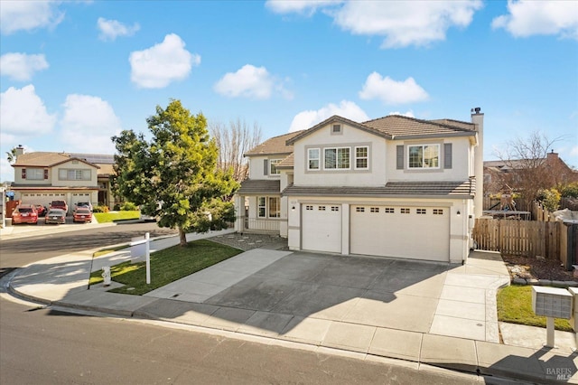 view of front of property featuring a garage