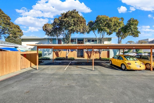 view of vehicle parking with a carport