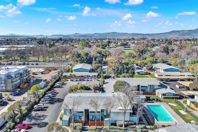 drone / aerial view featuring a mountain view