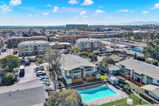 birds eye view of property featuring a mountain view