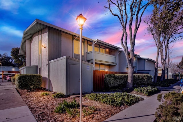 view of property exterior at dusk