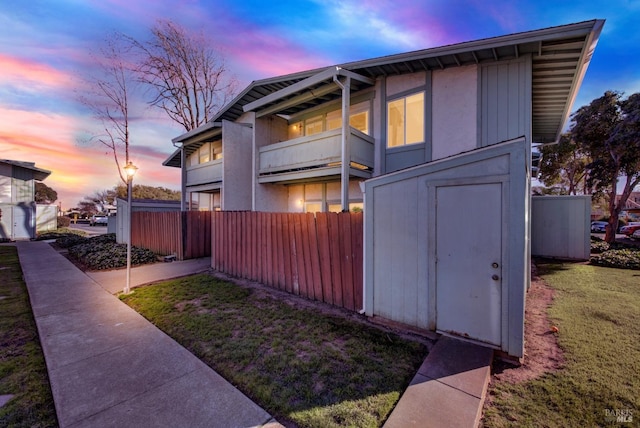 view of property exterior at dusk