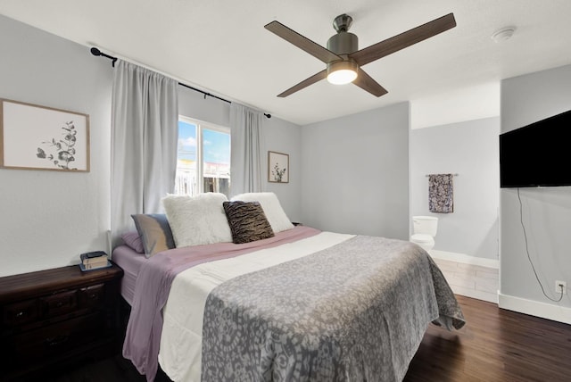 bedroom featuring ceiling fan and dark wood-type flooring