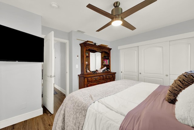 bedroom featuring a closet, ceiling fan, and wood-type flooring