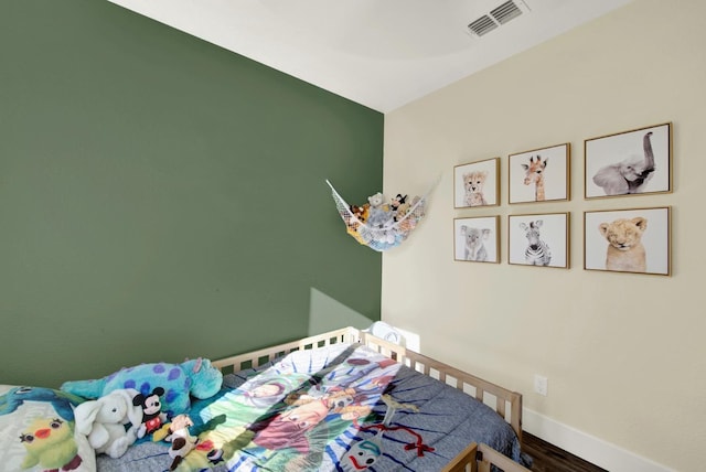 bedroom featuring hardwood / wood-style flooring