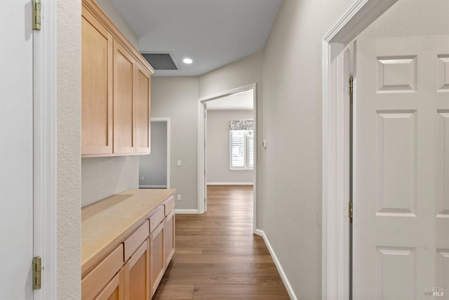 corridor featuring hardwood / wood-style flooring