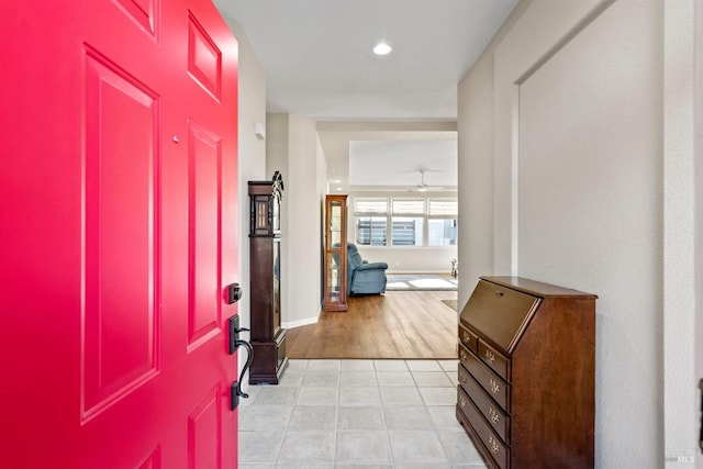 foyer with ceiling fan