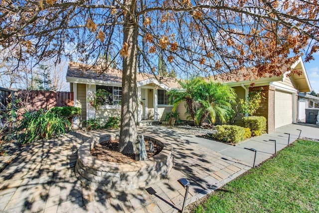 single story home featuring a garage