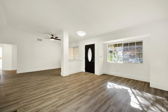 foyer with hardwood / wood-style floors and ceiling fan