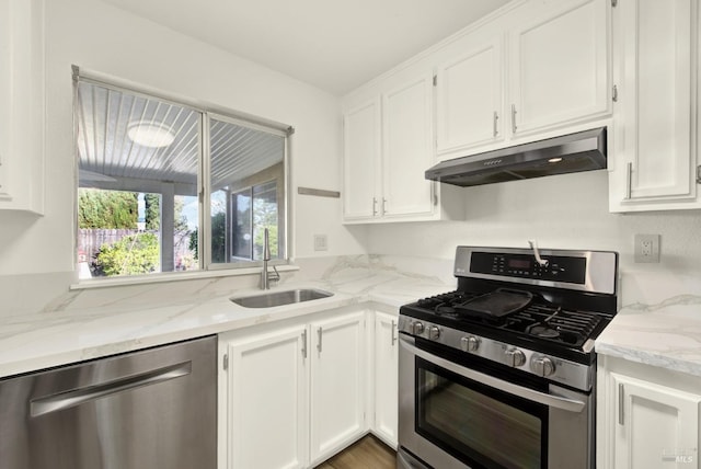 kitchen with white cabinetry, sink, and appliances with stainless steel finishes