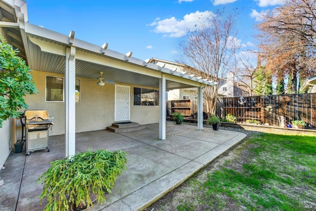 view of patio featuring ceiling fan and grilling area