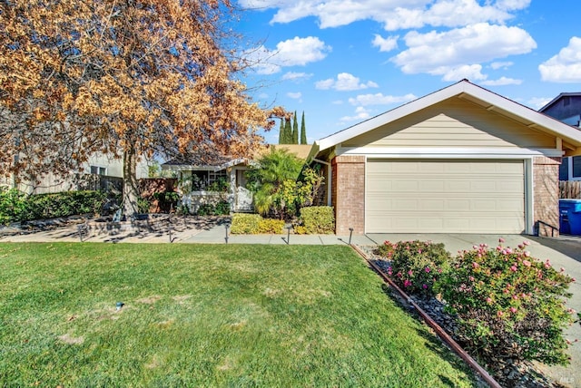 single story home with a garage and a front yard