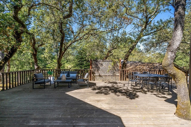 wooden deck with an outdoor hangout area