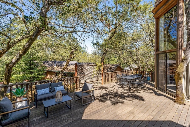 deck with an outdoor hangout area