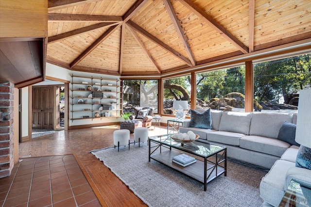 unfurnished living room featuring wooden ceiling, tile patterned flooring, beamed ceiling, and high vaulted ceiling