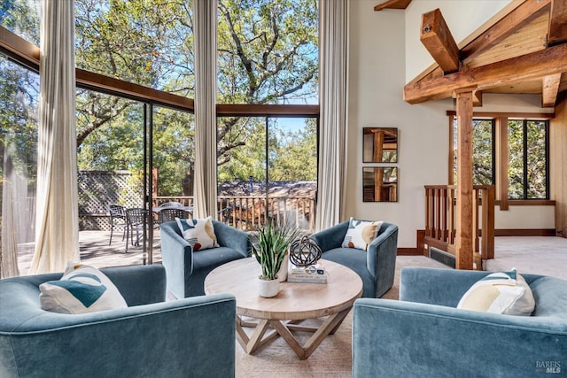 sunroom with beam ceiling