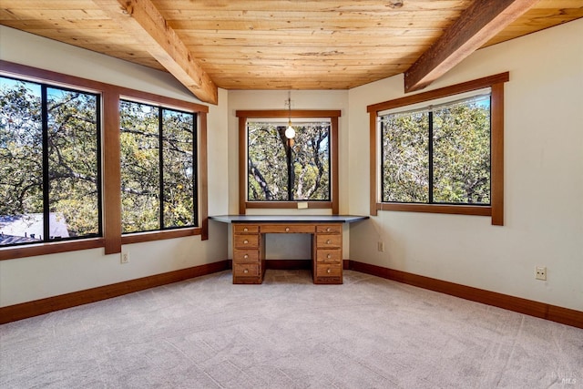 unfurnished sunroom with wooden ceiling and beam ceiling