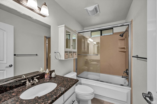 full bathroom featuring bath / shower combo with glass door, vanity, and toilet