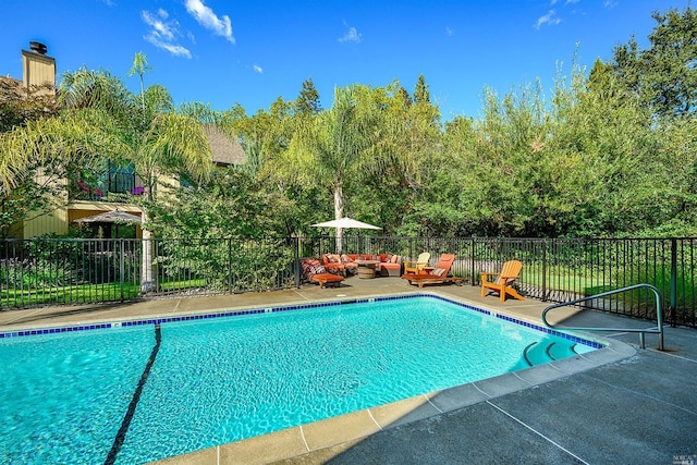 view of pool featuring an outdoor hangout area and a patio area