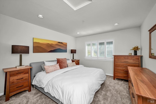 bedroom featuring light carpet