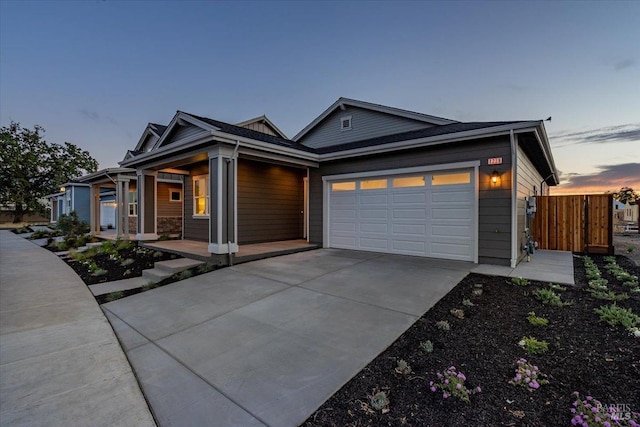 view of front of property with a garage