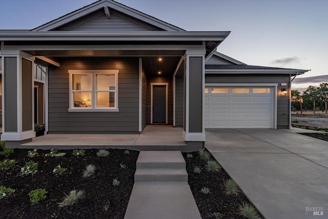 view of front of home with a garage