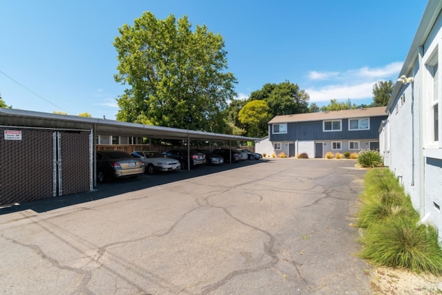 view of parking featuring a carport