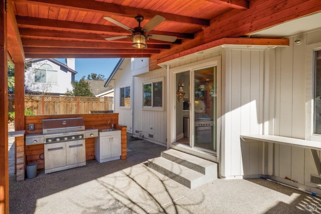 view of patio / terrace with area for grilling, grilling area, and ceiling fan