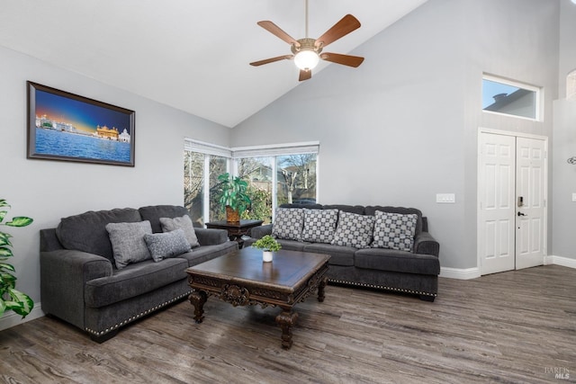 living room with wood-type flooring, high vaulted ceiling, and ceiling fan