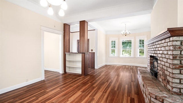 unfurnished living room featuring crown molding, dark hardwood / wood-style flooring, and a chandelier