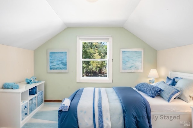 bedroom with vaulted ceiling