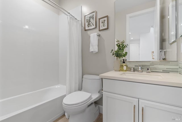 full bathroom featuring vanity, shower / tub combo, backsplash, and toilet