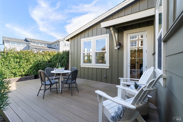 deck featuring outdoor dining space