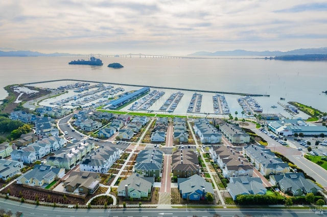 aerial view with a residential view and a water view